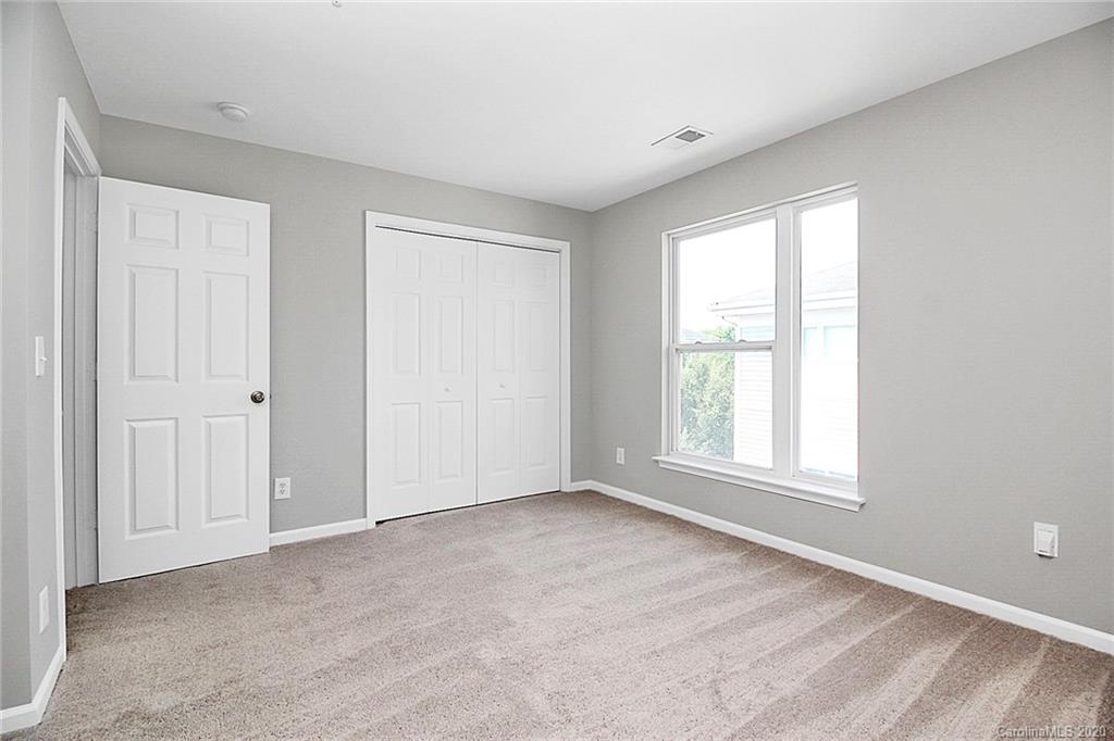 648 Raphael Place Charlotte, NC 28205 - Photo 28 of 48 an empty room with windows