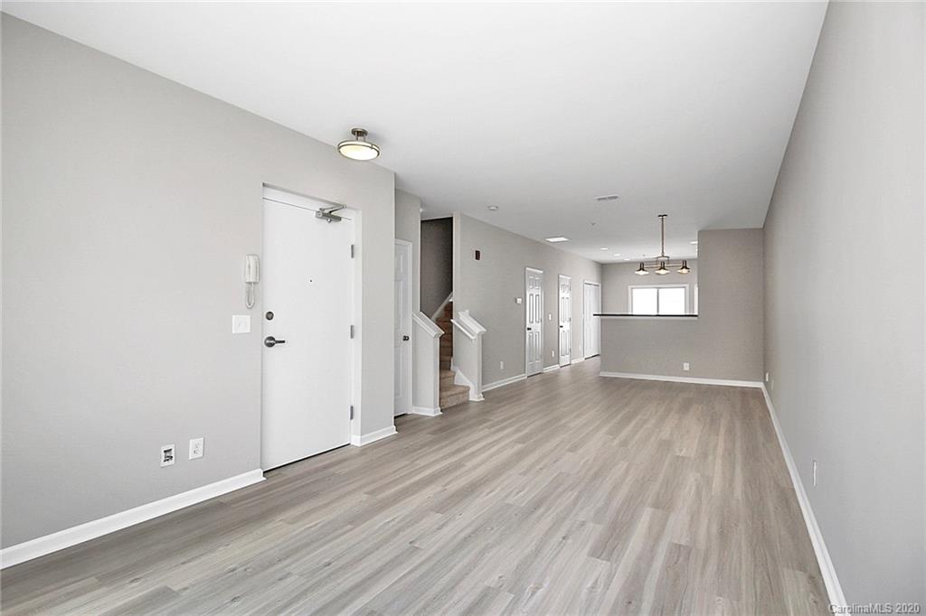 648 Raphael Place Charlotte, NC 28205 - Photo 8 of 48 wooden floor in an empty room with a window