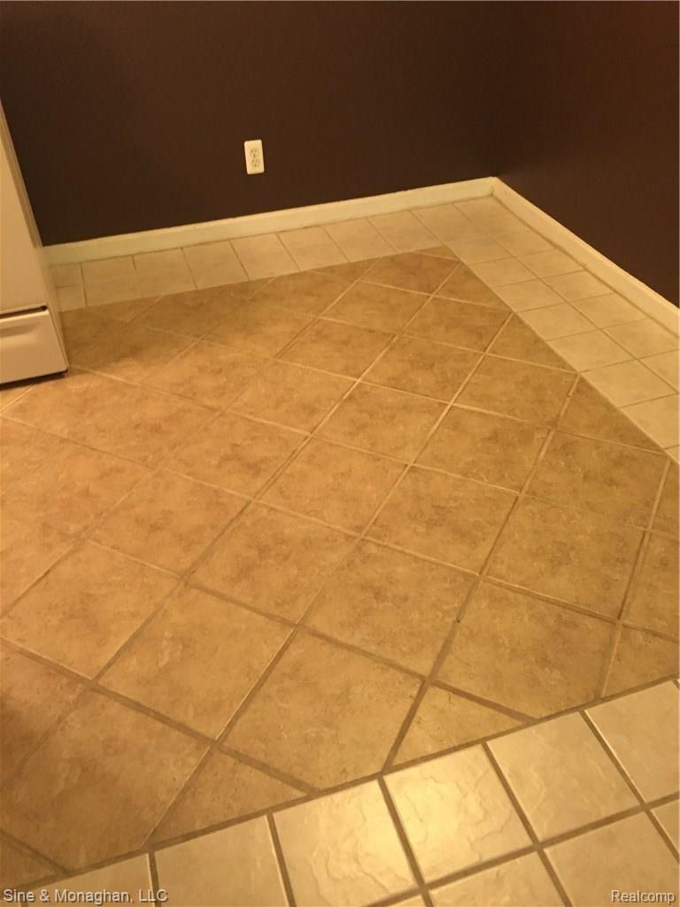 8192 24 Mile Road Utica, MI 48316 - Photo 14 of 26 Closer view of 12"x12" ceramic tile