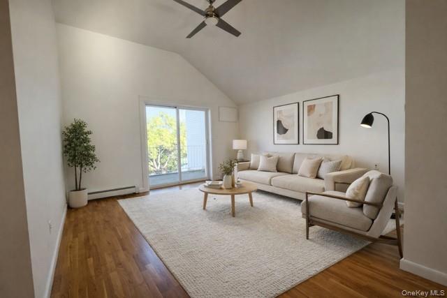 1307 Balcom Avenue Bronx, NY 10461 - Photo 5 of 26 a living room with furniture and a potted plant