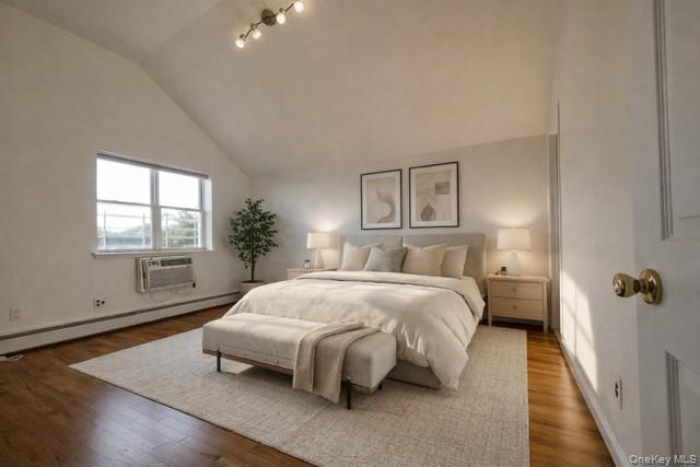 1307 Balcom Avenue Bronx, NY 10461 - Photo 10 of 26 a bedroom with a bed lamp closet and window
