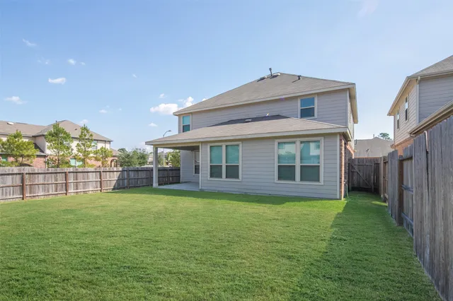 a view of a house with a swimming pool