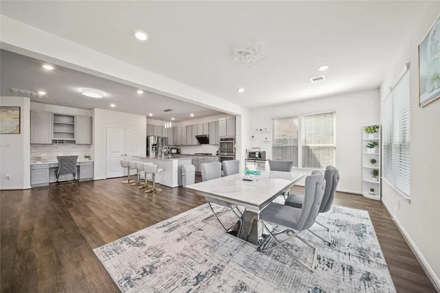 a view of a dining room with furniture