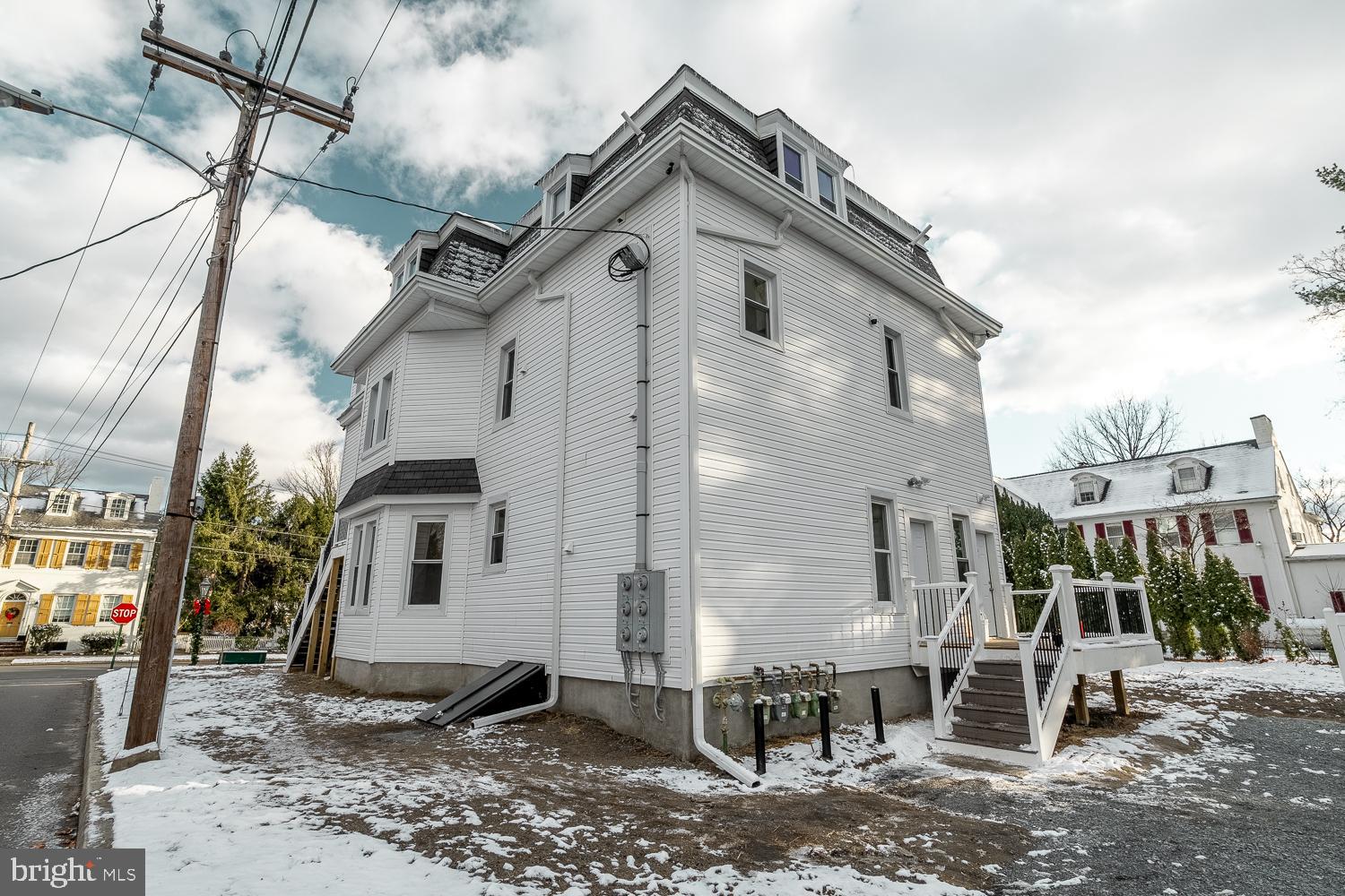 115 Hanover Street, Unit 4 Pemberton, NJ 08068 - Photo 13 of 14 a view of a house with a yard