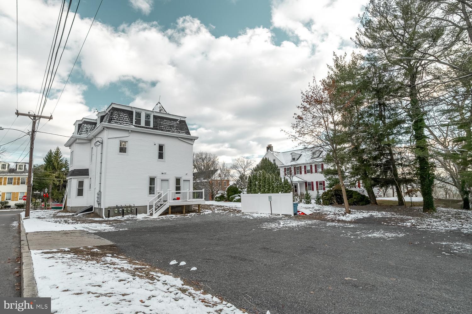 115 Hanover Street, Unit 4 Pemberton, NJ 08068 - Photo 14 of 14 a view of a street with a building