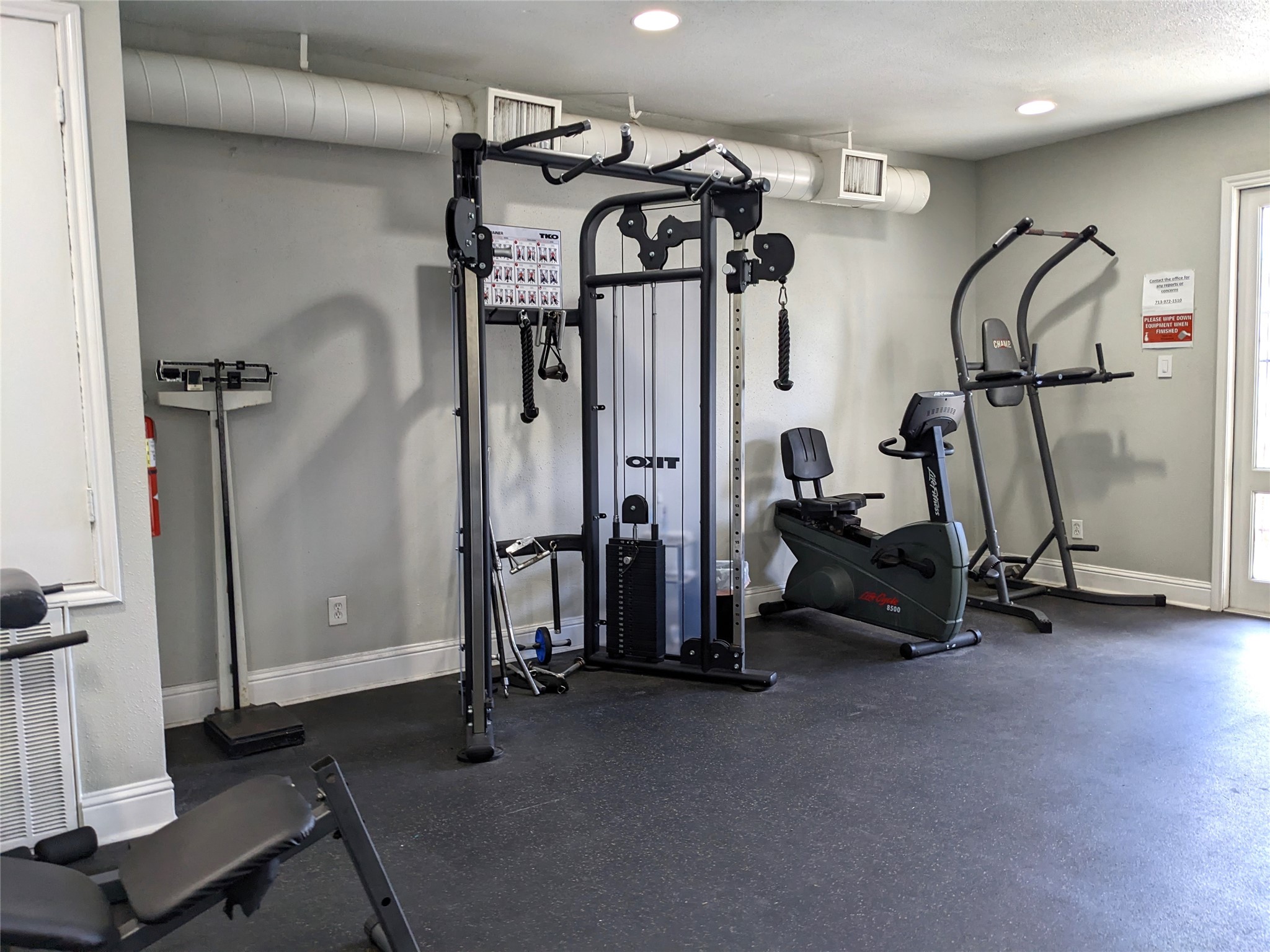 2100 Tanglewilde Street, Unit 421 Houston, TX 77063 - Photo 21 of 21 a view of a room with gym equipment