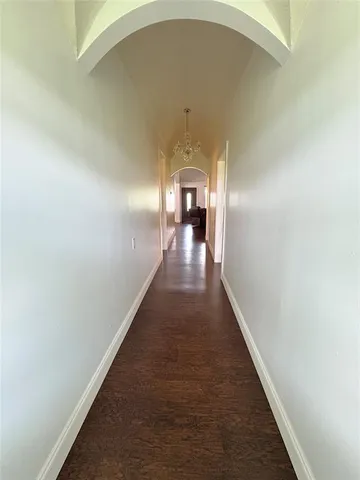 a view of a hallway with entryway