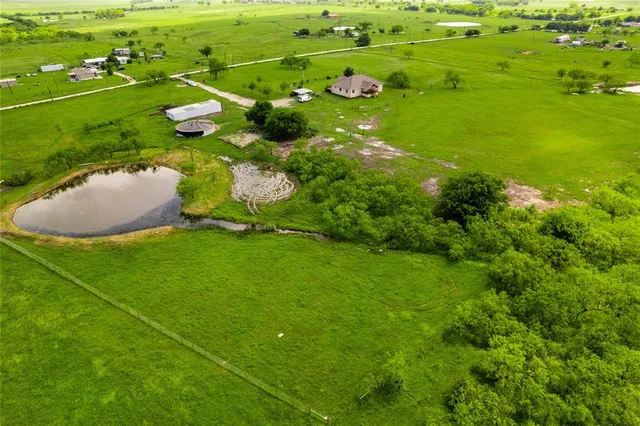a view of a golf course with a lake