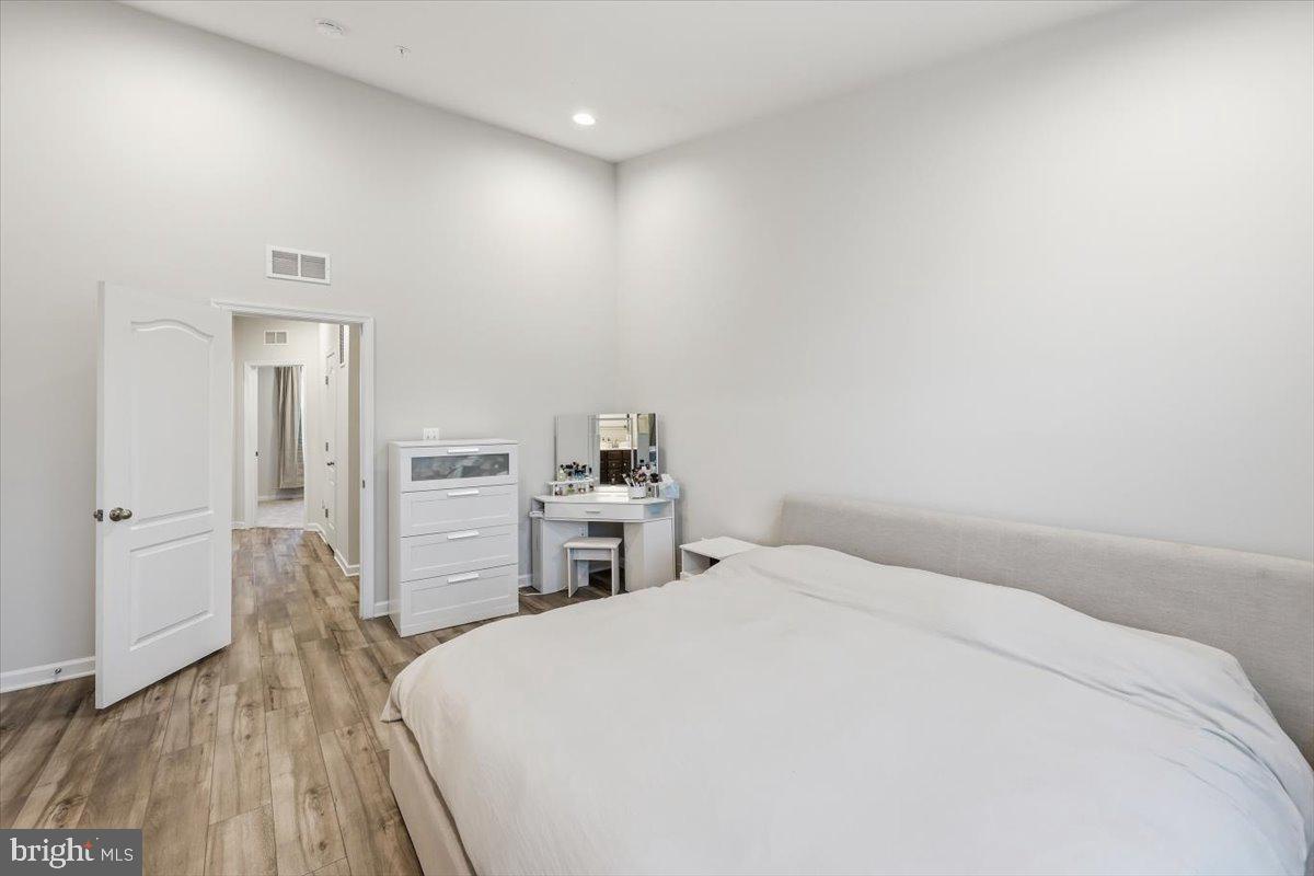 1833 Clancy Avenue Frederick, MD 21702 - Photo 21 of 43 Serene bedroom with modern elegance.