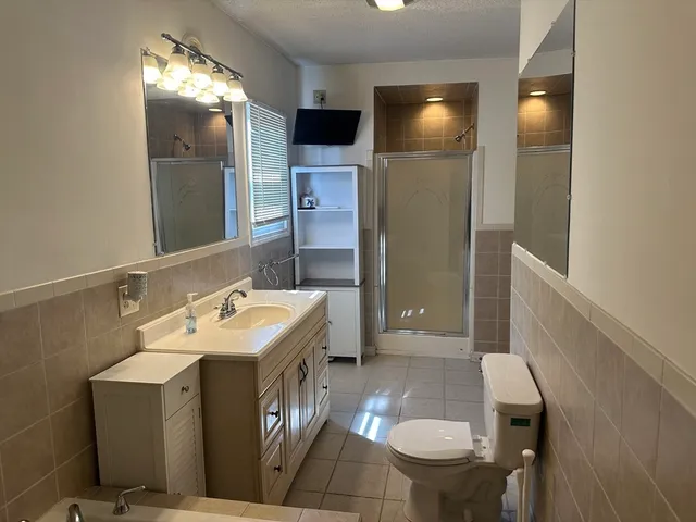 a bathroom with a sink and mirror