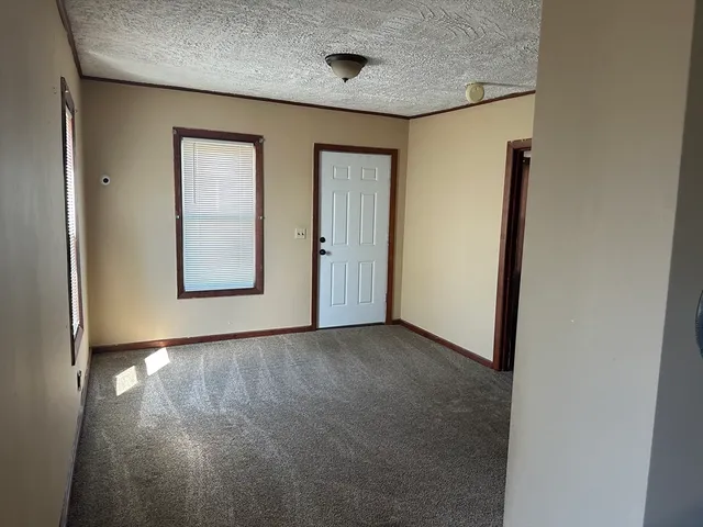 an empty room with window