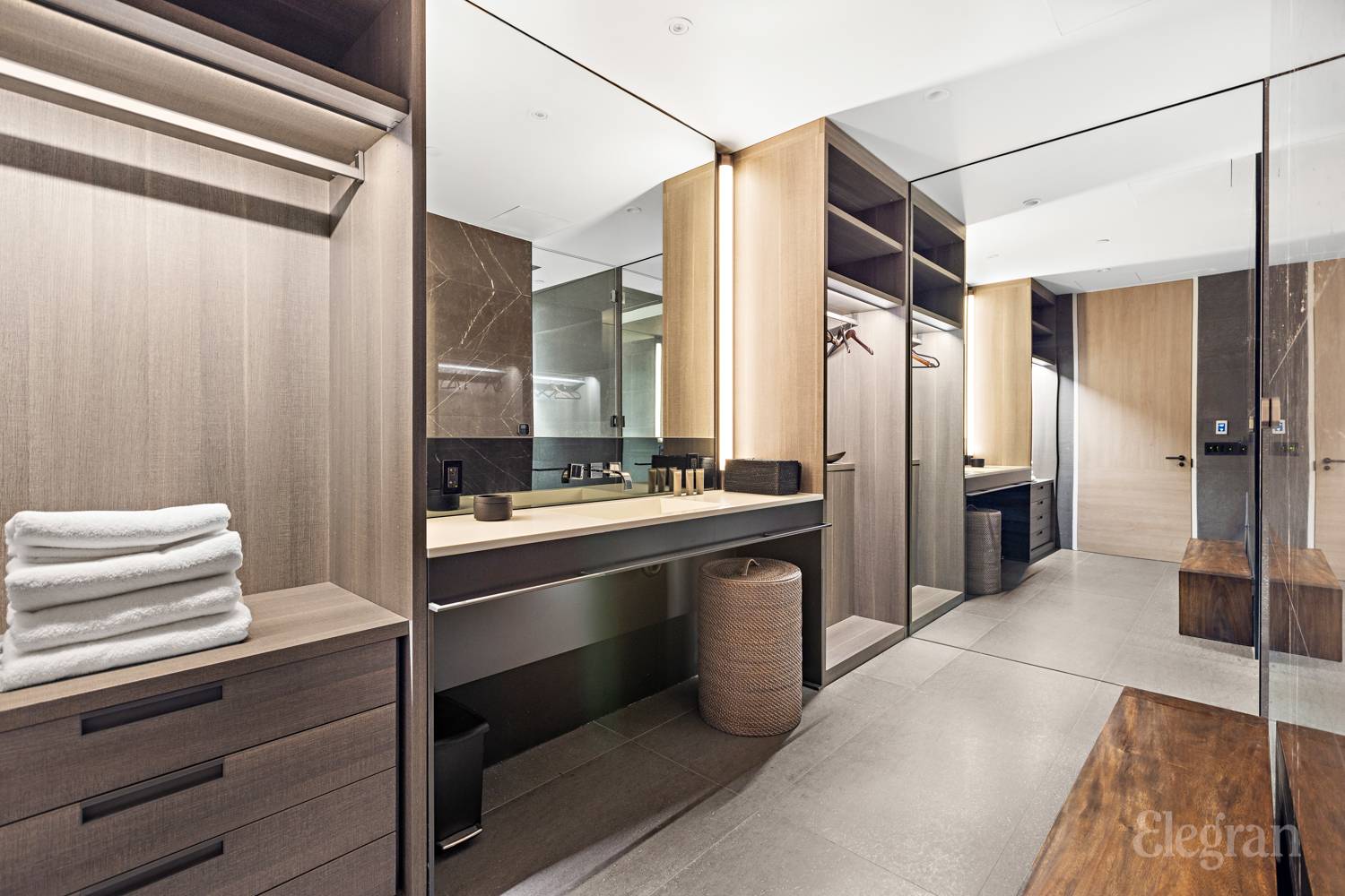 522 West 29th Street, Unit B3 Manhattan, NY 10001 - Photo 13 of 19 a bathroom with a double vanity sink and mirror