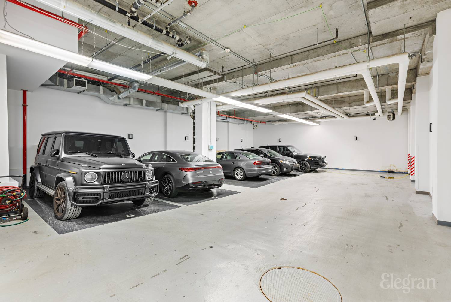 522 West 29th Street, Unit B3 Manhattan, NY 10001 - Photo 18 of 19 a view of parking garage with cars