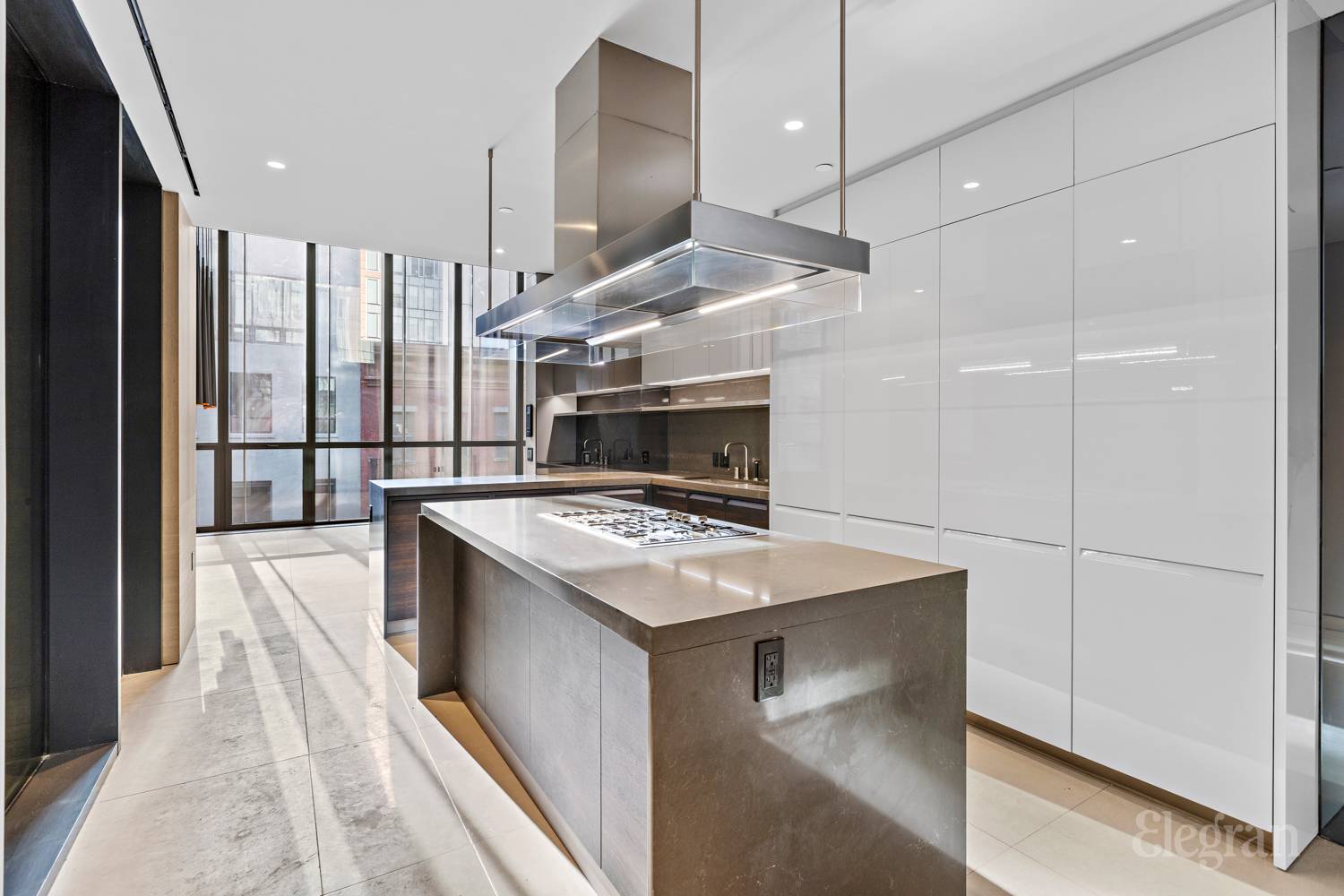 522 West 29th Street, Unit B3 Manhattan, NY 10001 - Photo 4 of 19 a kitchen with a stove and a refrigerator