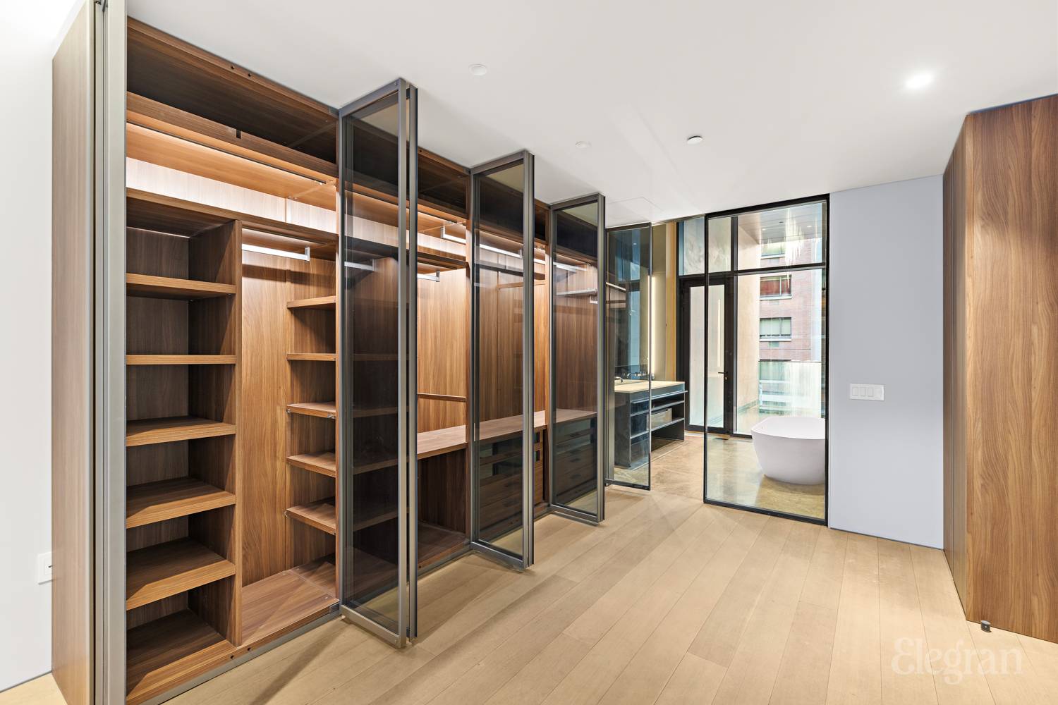 522 West 29th Street, Unit B3 Manhattan, NY 10001 - Photo 7 of 19 a view of walk in closet with empty racks