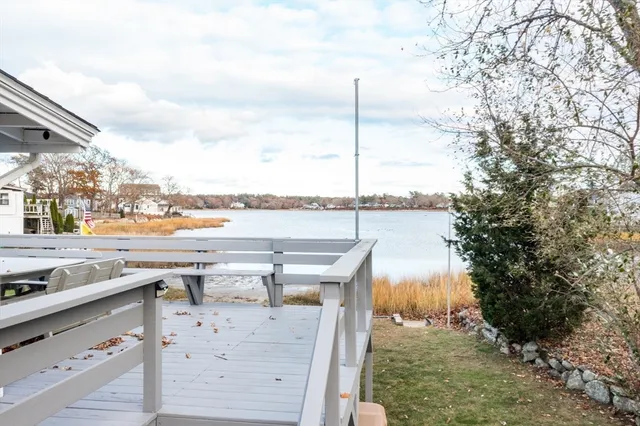 a view of outdoor space with wooden floor