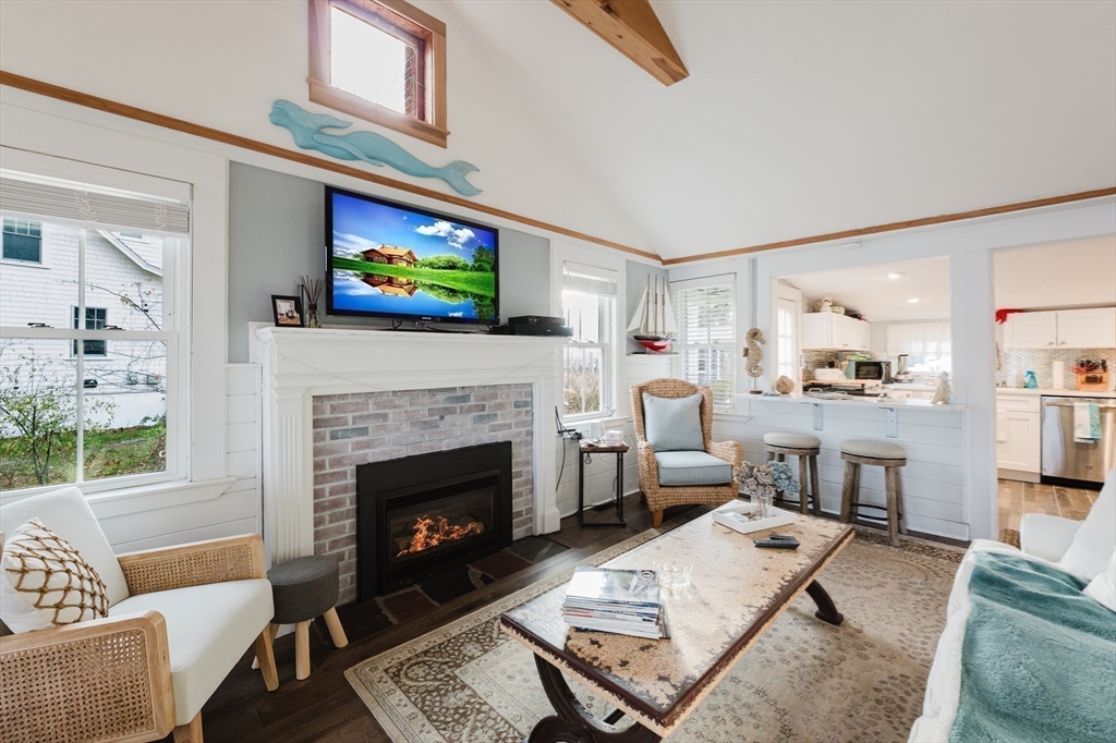 4 Ross Avenue Wareham, MA 02571 - Photo 24 of 39 a living room with furniture and a fireplace
