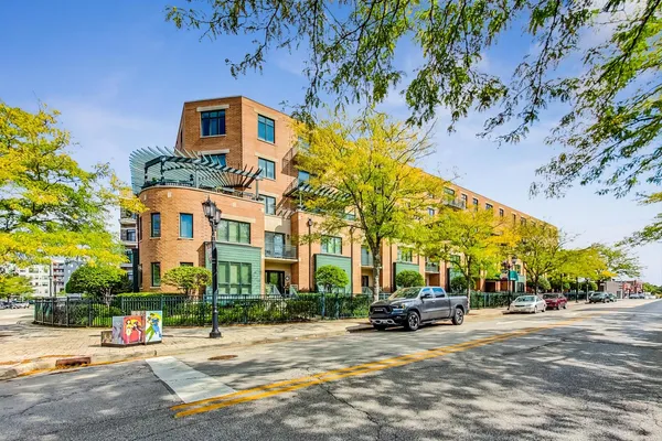 a view of a building with a street