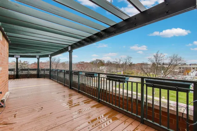 a view of balcony with furniture