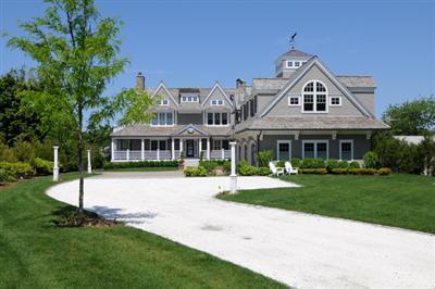 415 Monomoscoy Road Mashpee, MA 02649 - Photo 1 of 17 a front view of a house with a yard