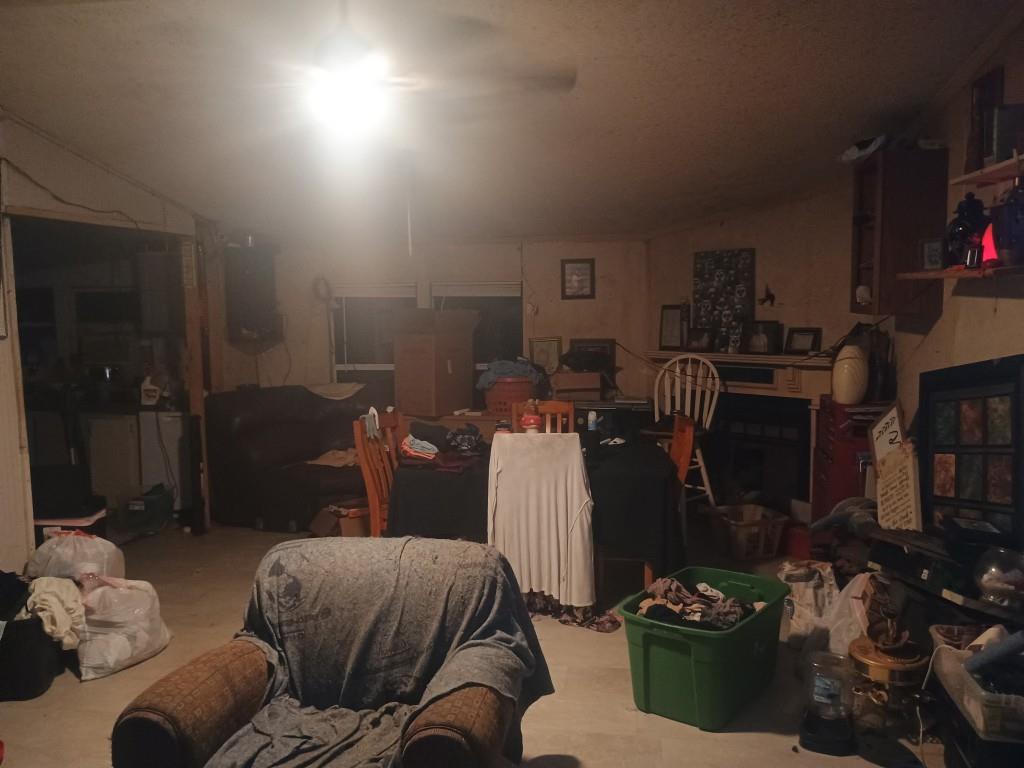 61 Lake Rd Court Ellijay, GA 30540 - Photo 12 of 14 a living room with furniture and a window