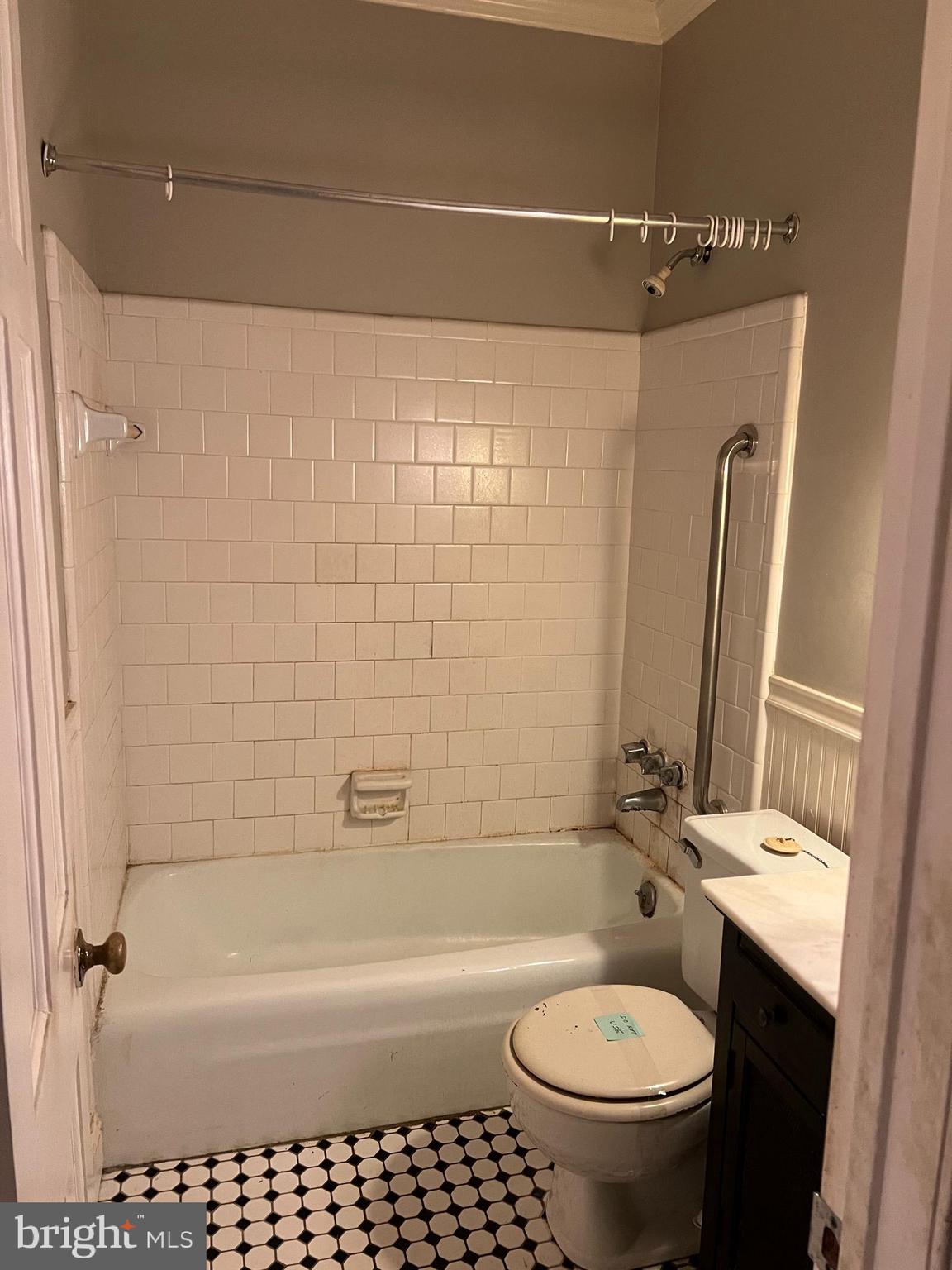 422 11th Street Southeast Washington, DC 20003 - Photo 22 of 24 a bathroom with a sink a toilet and shower