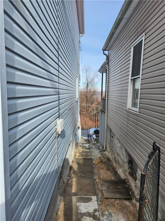 5388 Warble Street Pittsburgh, PA 15224 - Photo 2 of 14 a view of a pathway with a balcony