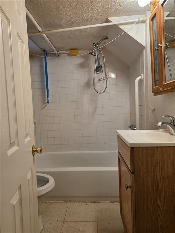 5388 Warble Street Pittsburgh, PA 15224 - Photo 9 of 14 a bathroom with a granite countertop sink a toilet and shower