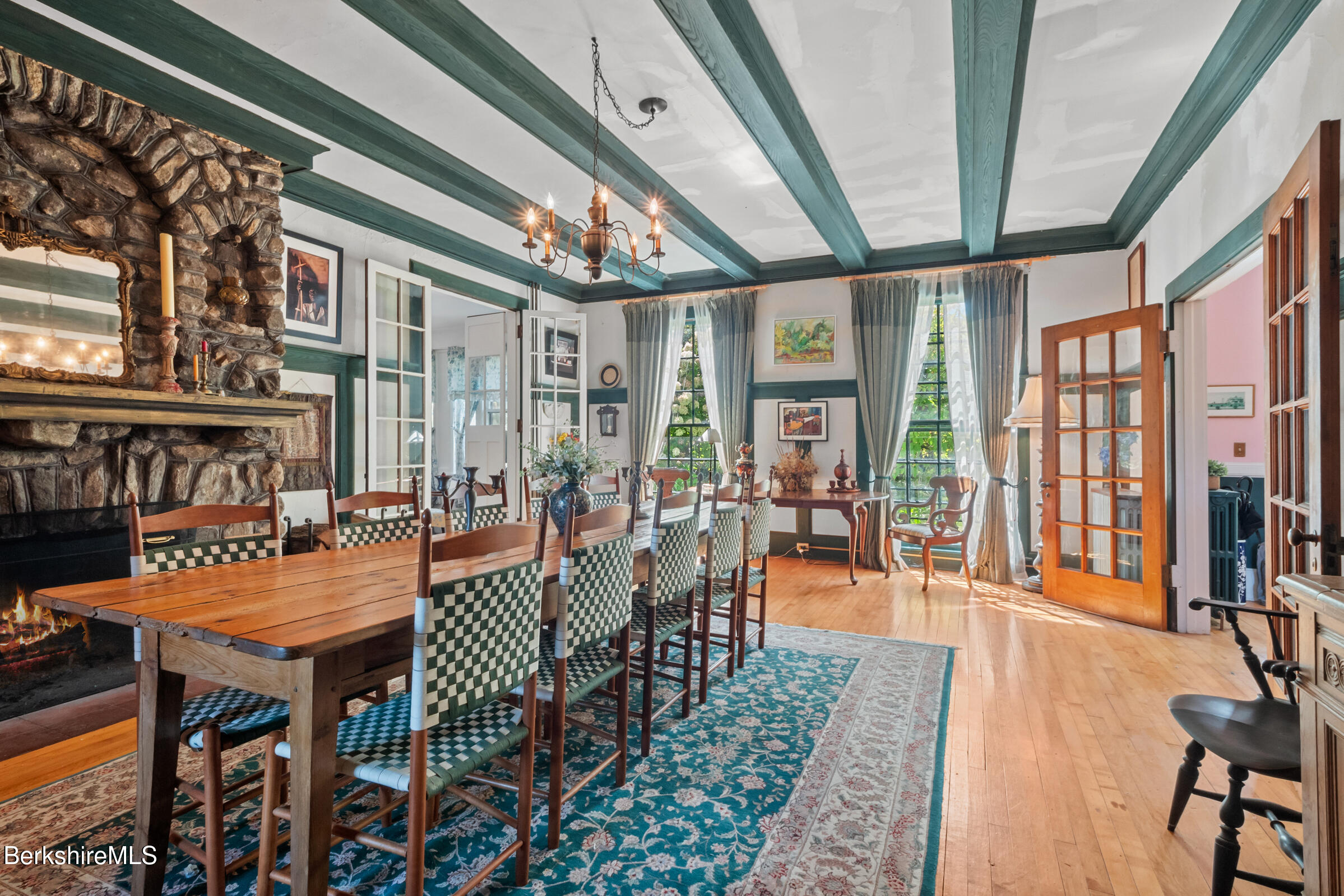 535 Main Road Monterey, MA 01245 - Photo 16 of 45 a outdoor dining space with furniture and wooden floor