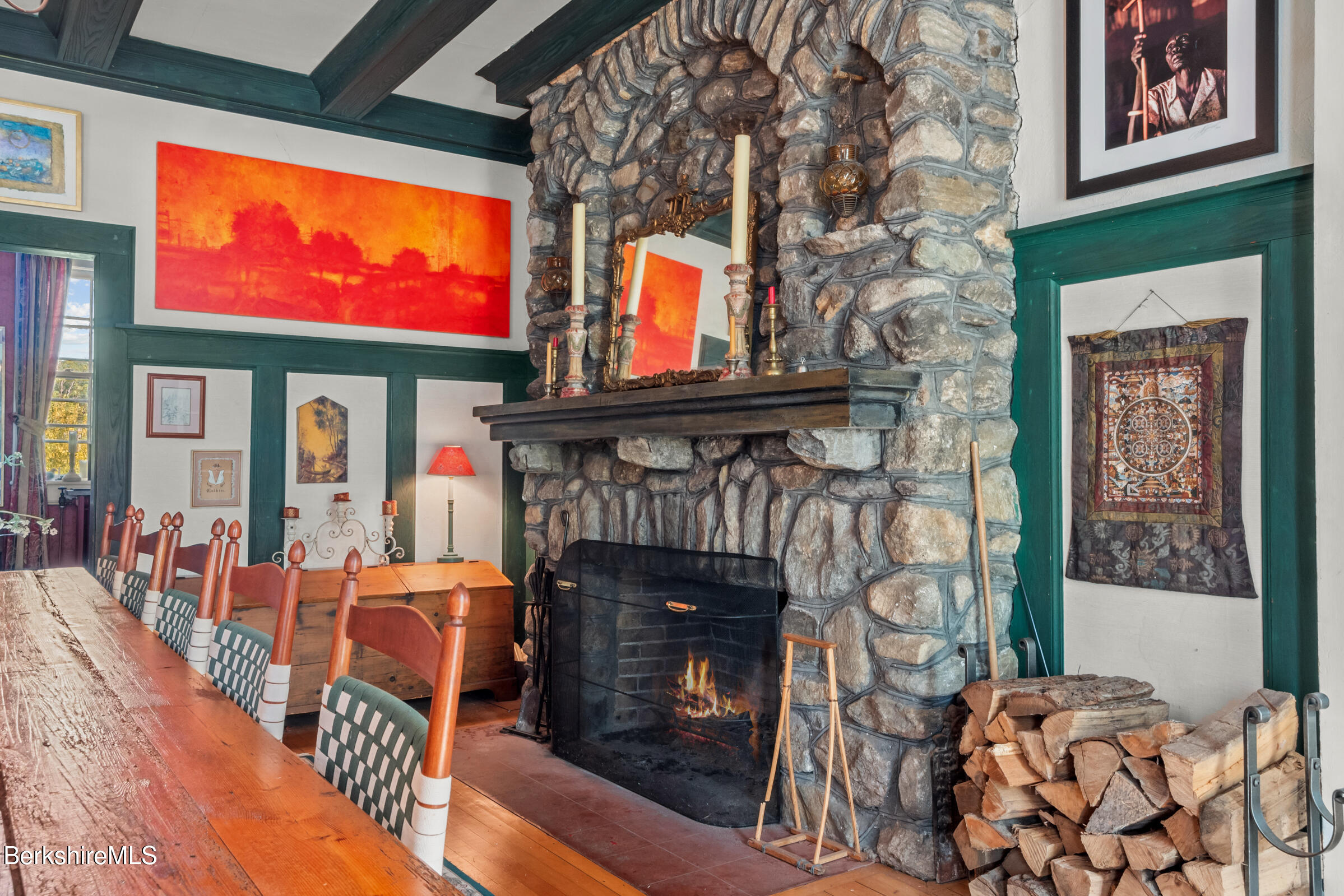 535 Main Road Monterey, MA 01245 - Photo 17 of 45 a living room with furniture a fireplace and windows