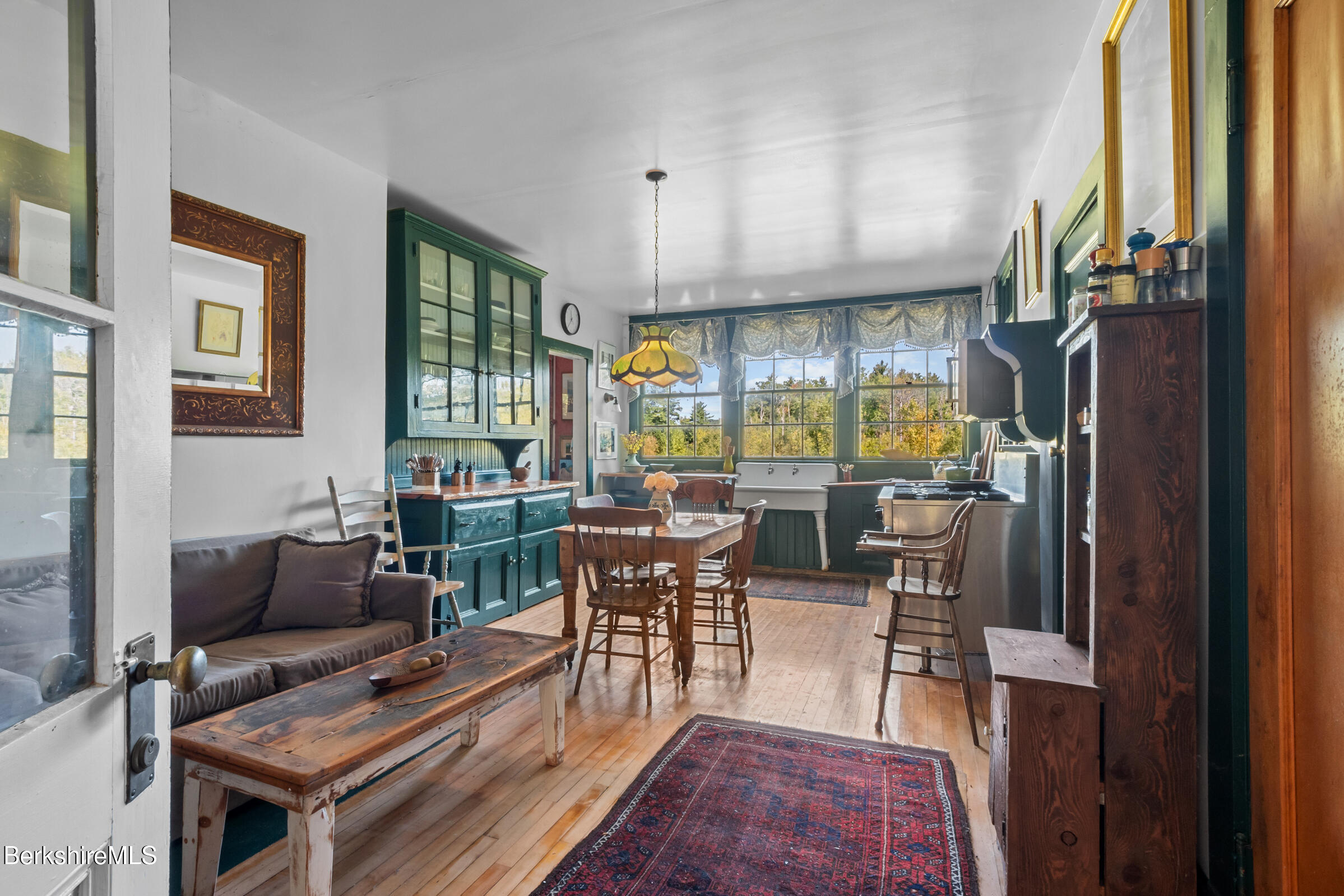 535 Main Road Monterey, MA 01245 - Photo 21 of 45 a living room with lots of furniture and a window