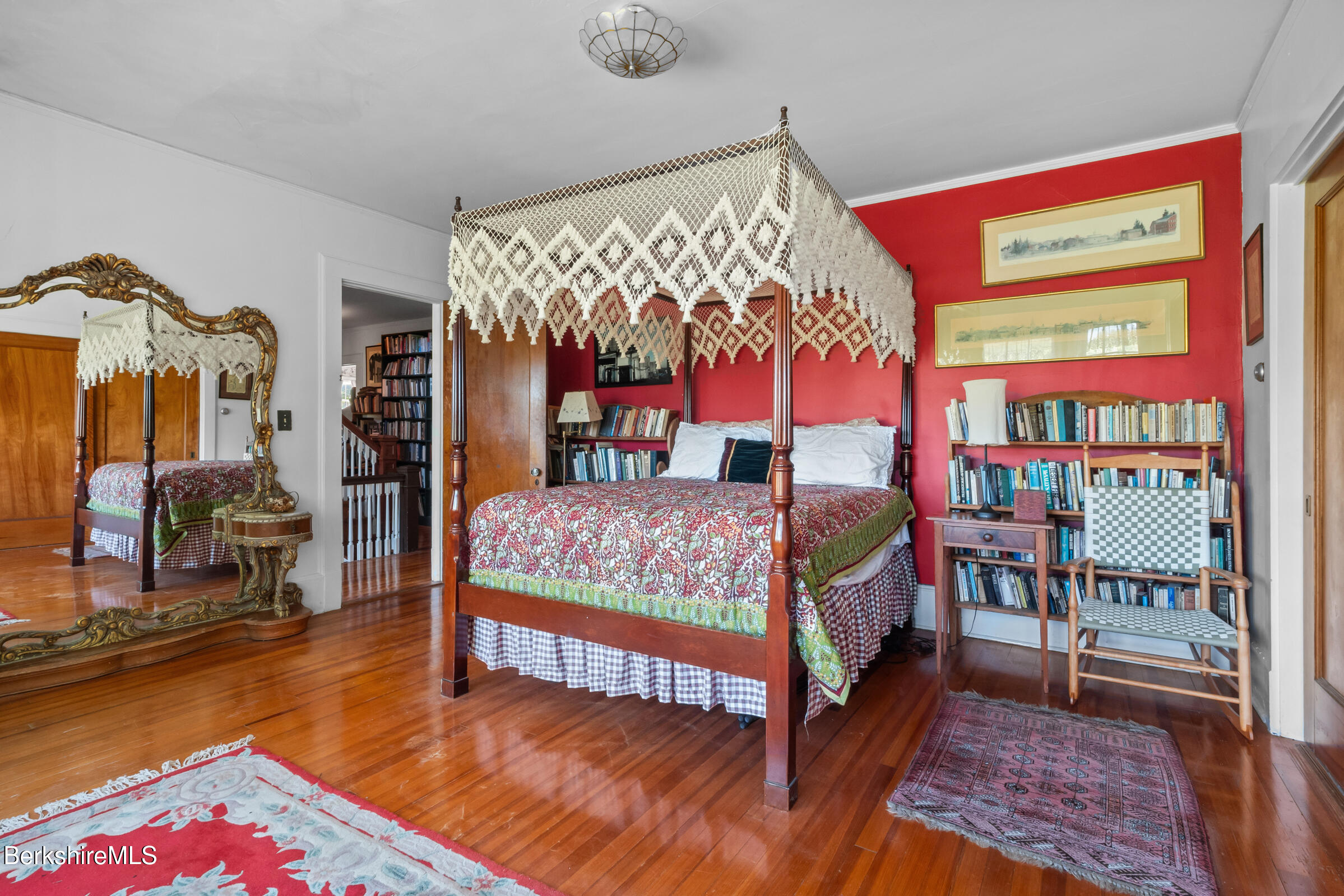 535 Main Road Monterey, MA 01245 - Photo 28 of 45 a bedroom with a bed and wooden floor