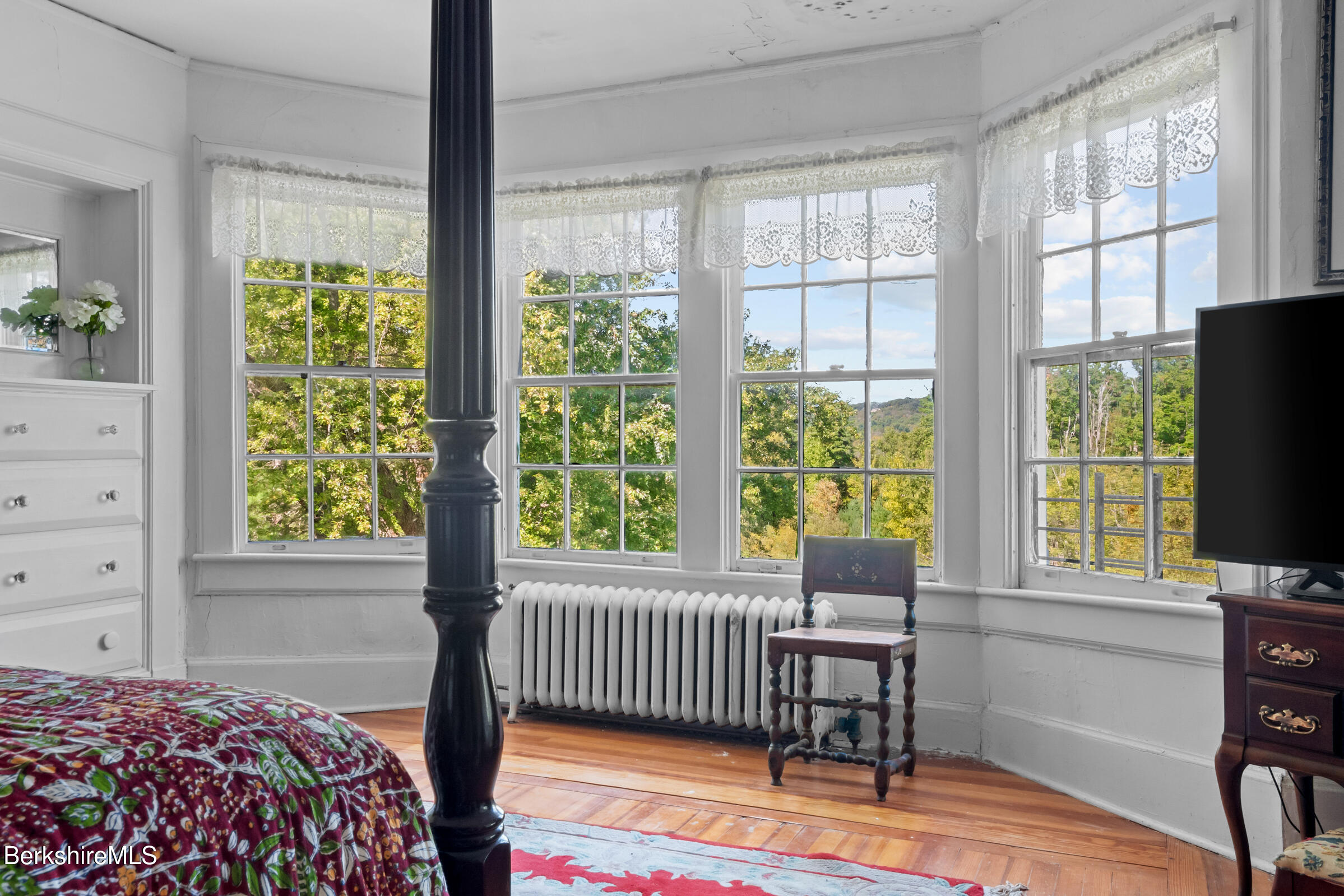 535 Main Road Monterey, MA 01245 - Photo 29 of 45 a bedroom with a bed and a window