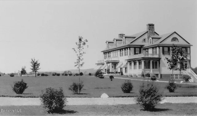 a front view of a house with swimming pool