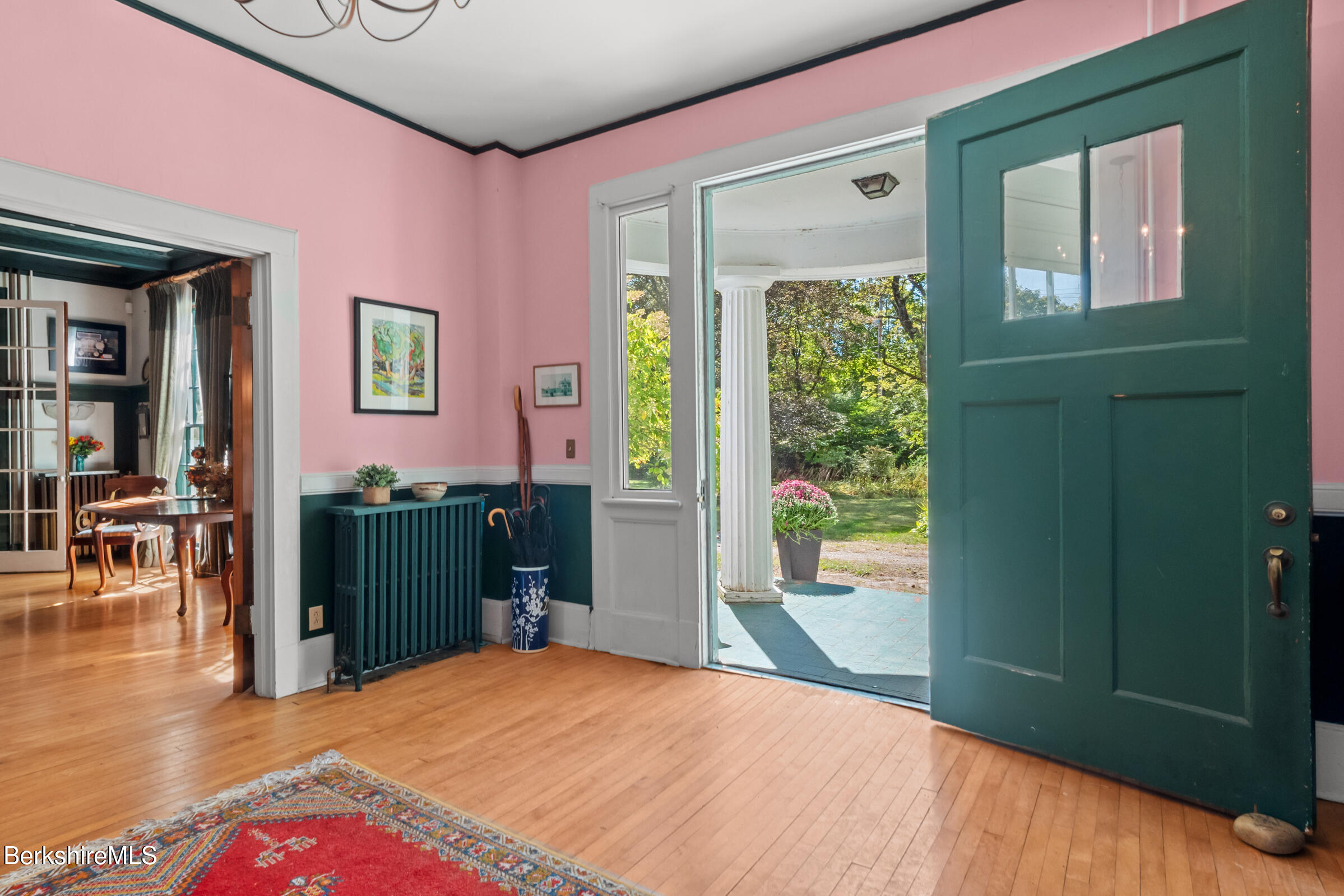 535 Main Road Monterey, MA 01245 - Photo 8 of 45 a bedroom with a bed and a bookshelf