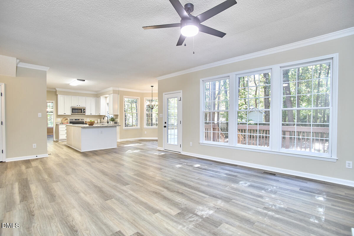 2800 Shofield Court Raleigh, NC 27615 - Photo 14 of 38 15 - Family Room to Kitchen