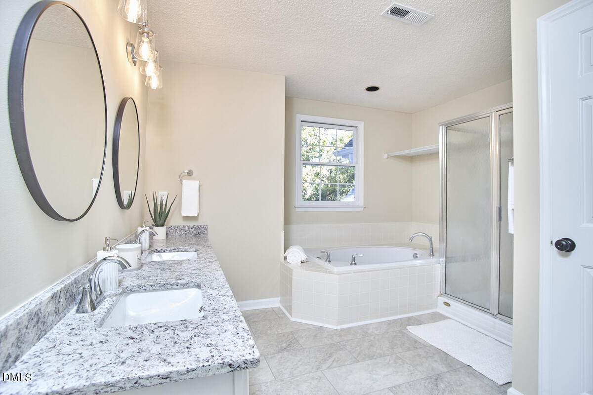 2800 Shofield Court Raleigh, NC 27615 - Photo 19 of 38 21 - Primary Bathroom