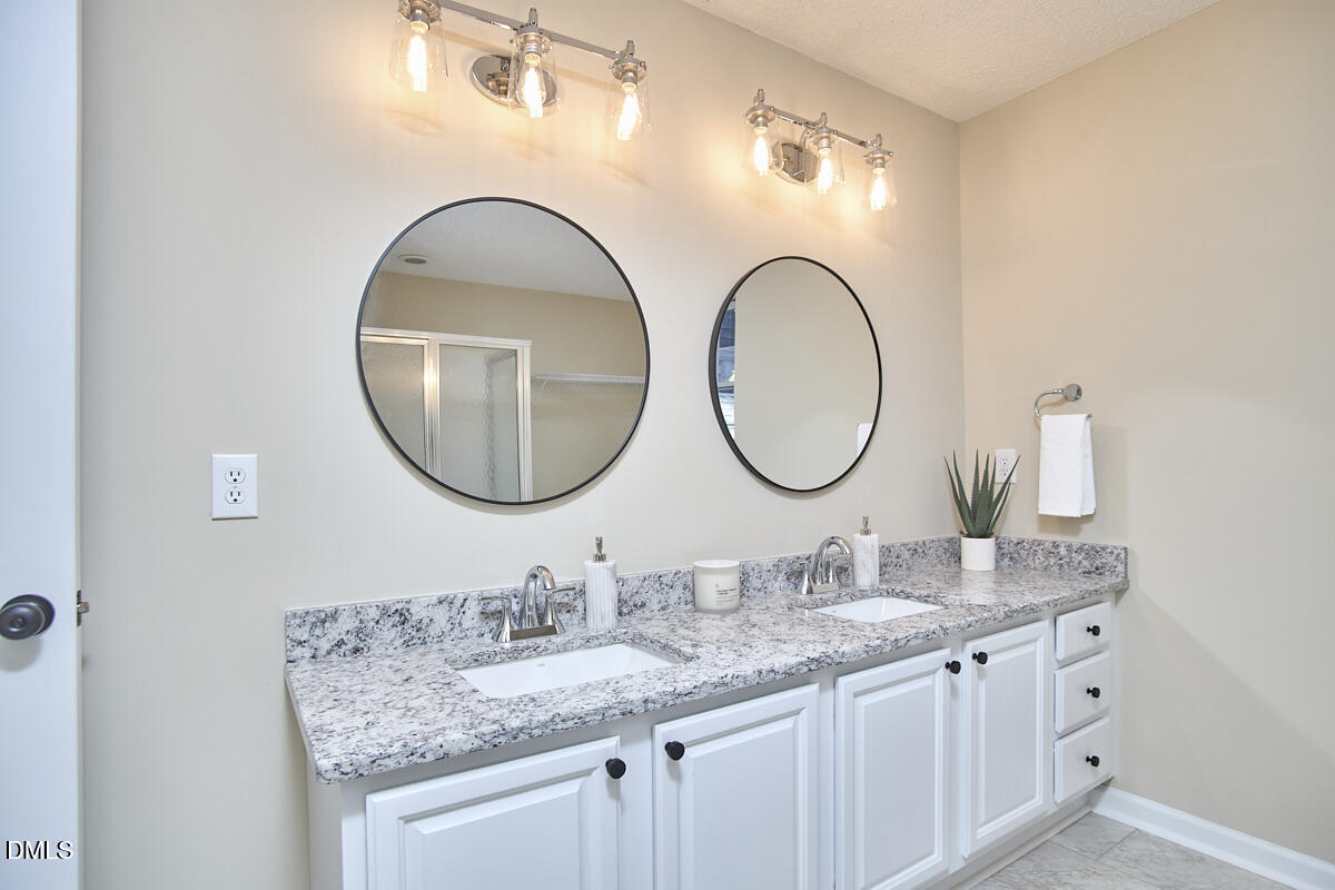 2800 Shofield Court Raleigh, NC 27615 - Photo 20 of 38 22 - Primary Bathoom