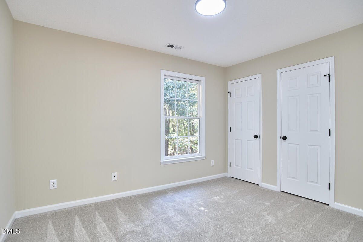 2800 Shofield Court Raleigh, NC 27615 - Photo 23 of 38 25 - Bedroom Three