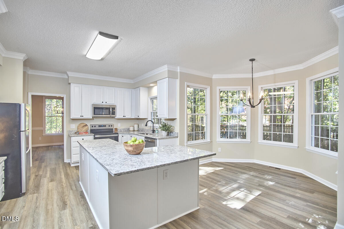 2800 Shofield Court Raleigh, NC 27615 - Photo 8 of 38 8 - Kitchen + Breakfast Room