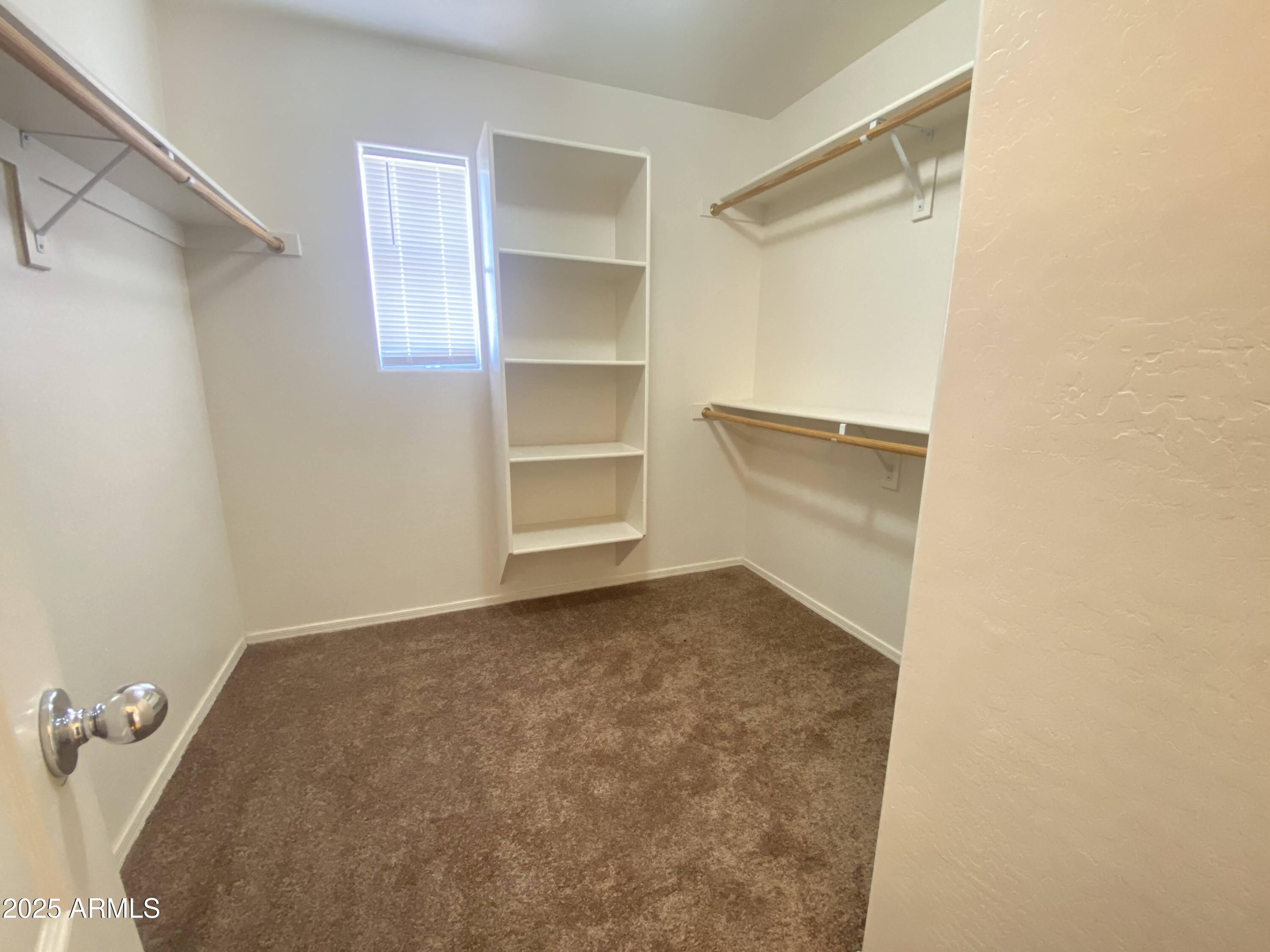2036 West Quick Draw Way San Tan Valley, AZ 85144 - Photo 13 of 19 a view of room and empty room