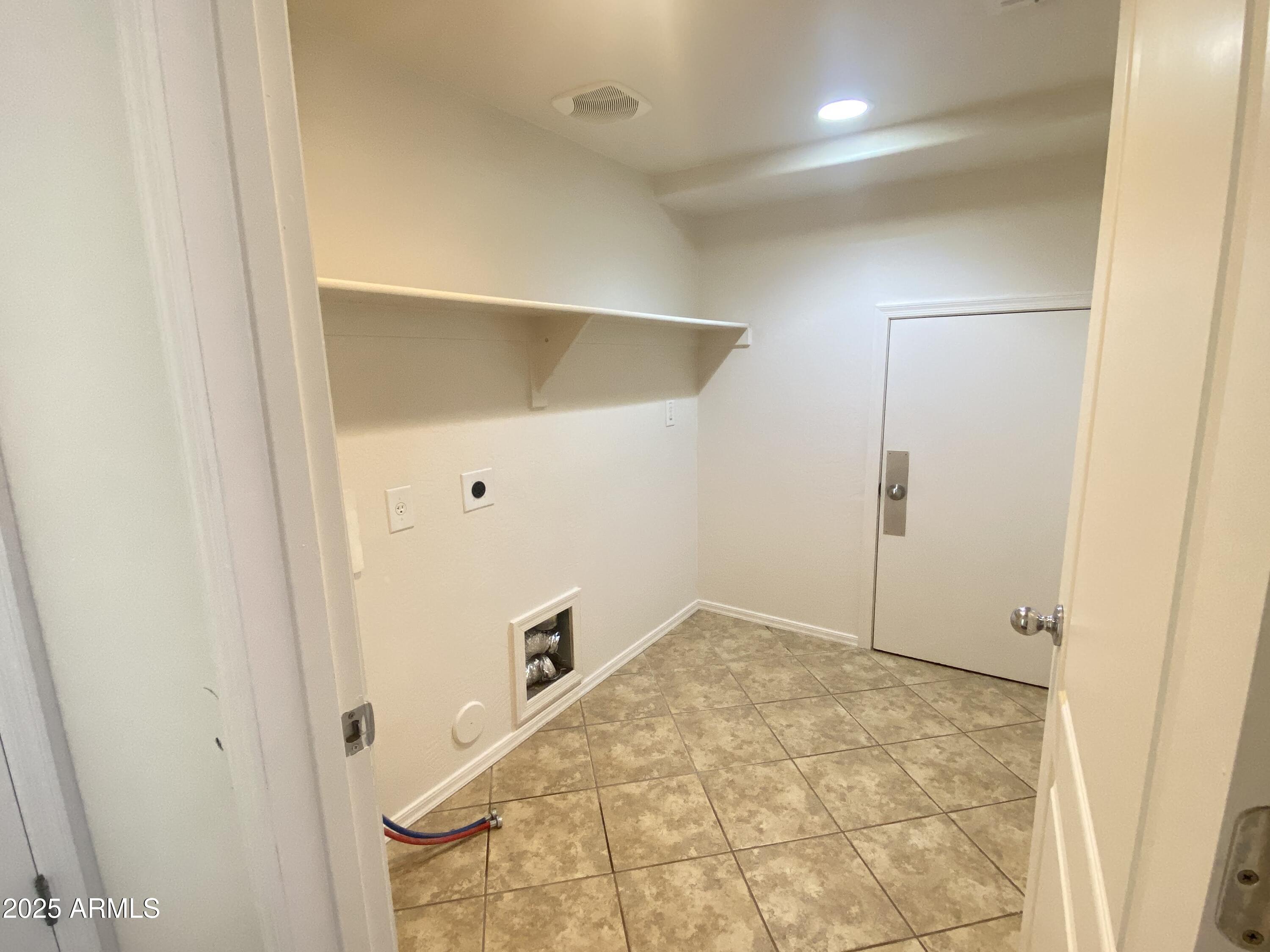 2036 West Quick Draw Way San Tan Valley, AZ 85144 - Photo 17 of 19 a view of an empty room