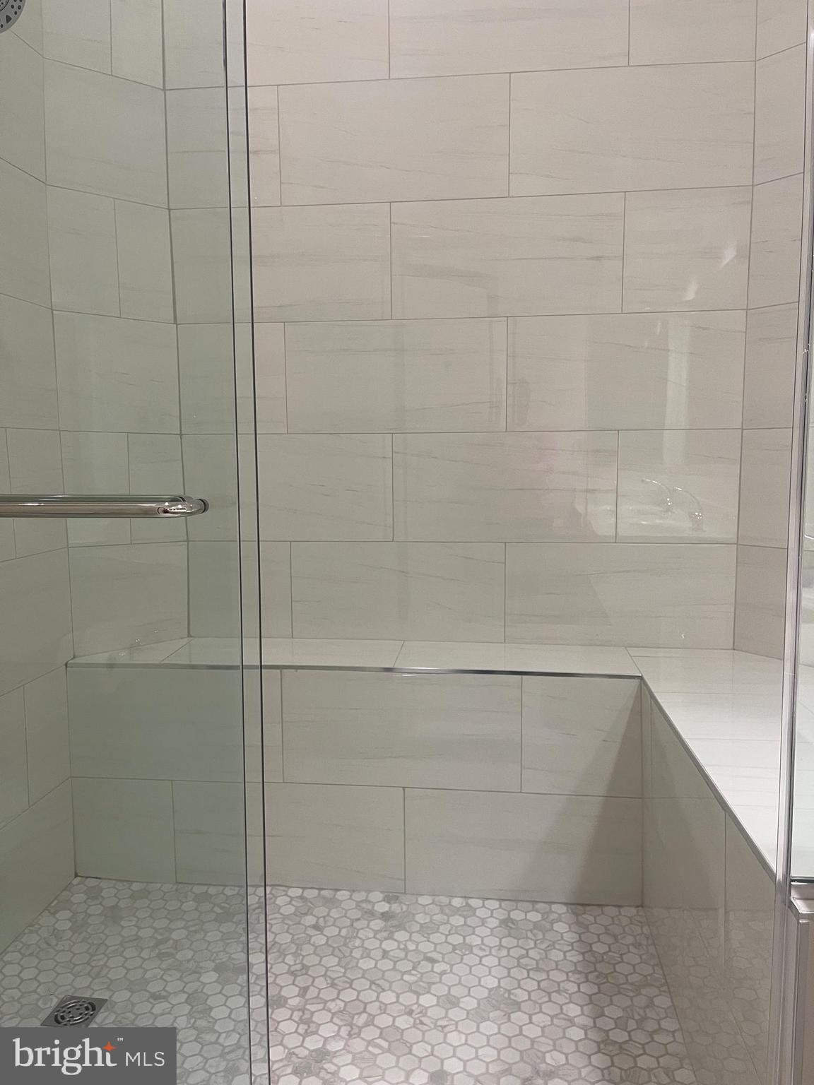 13701 Modrad Way, Unit 9C34 Silver Spring, MD 20904 - Photo 17 of 26 a bathroom with a shower