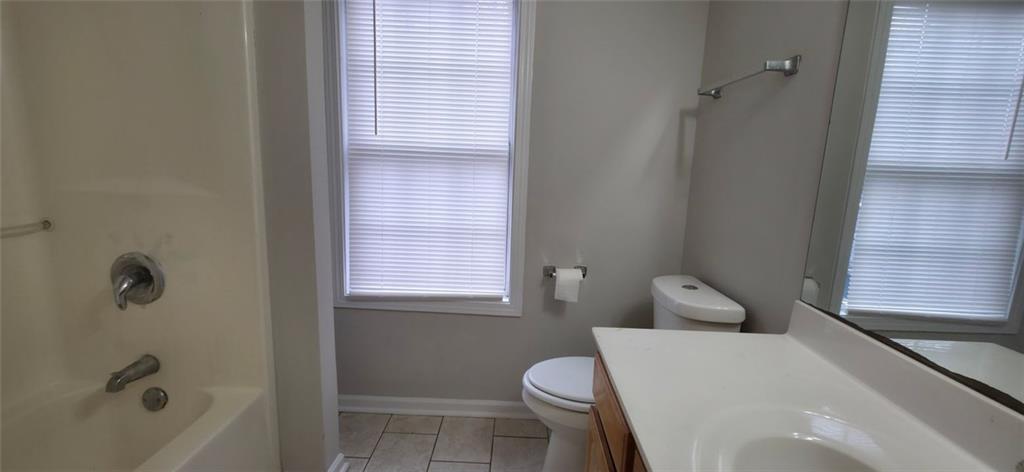 162 Walnut Street Southwest Atlanta, GA 30314 - Photo 12 of 18 a bathroom with a sink and toilet
