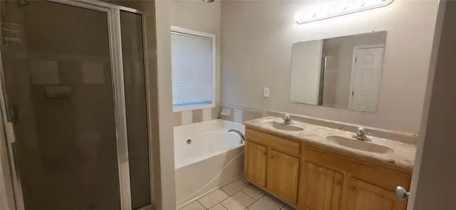 a bathroom with a sink and a bathtub