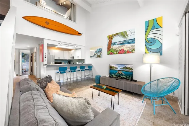 a living room with furniture and a table