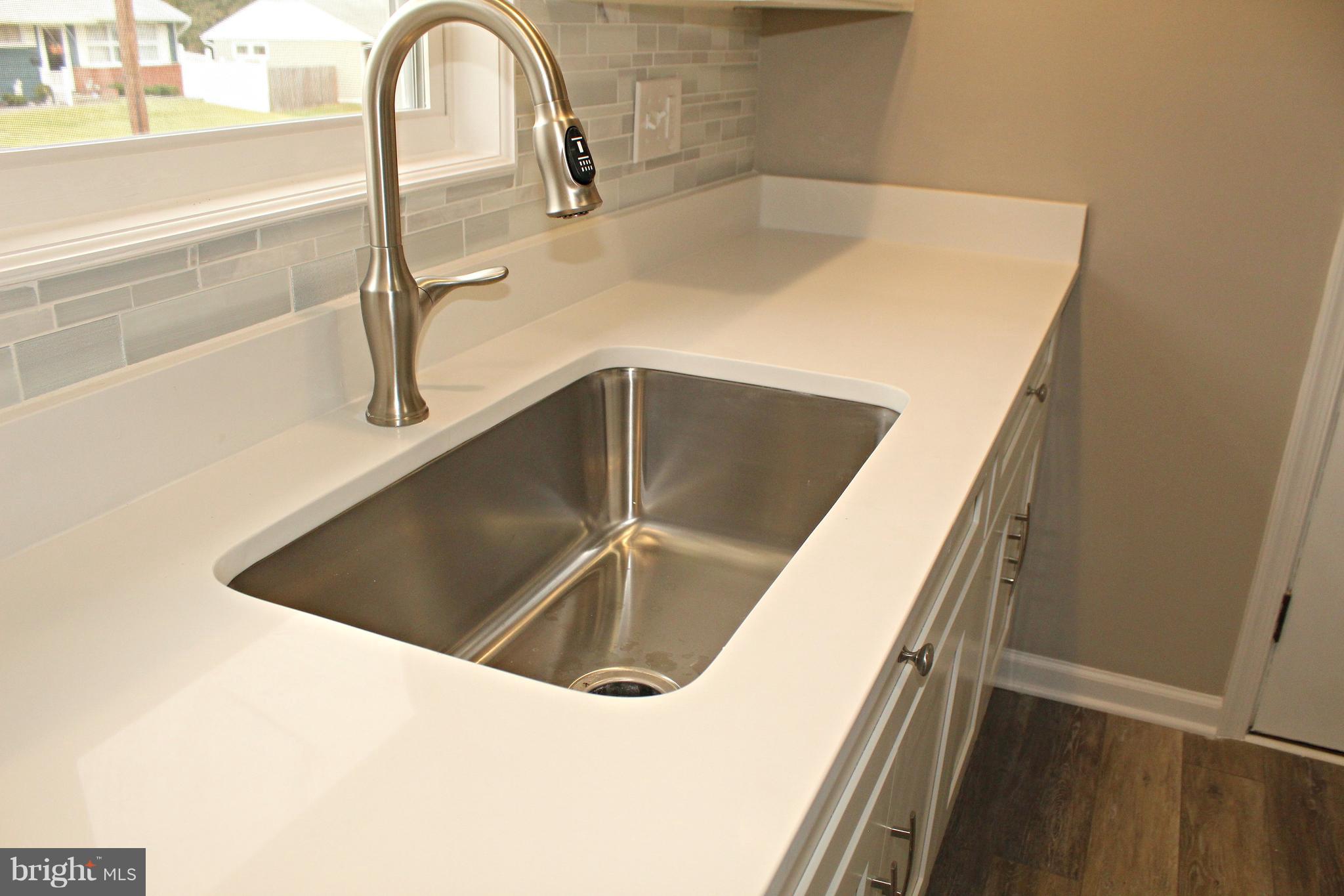 658 Andrews Road Aberdeen, MD 21001 - Photo 3 of 27 Quartz Countertops w/ Tile Backsplash!