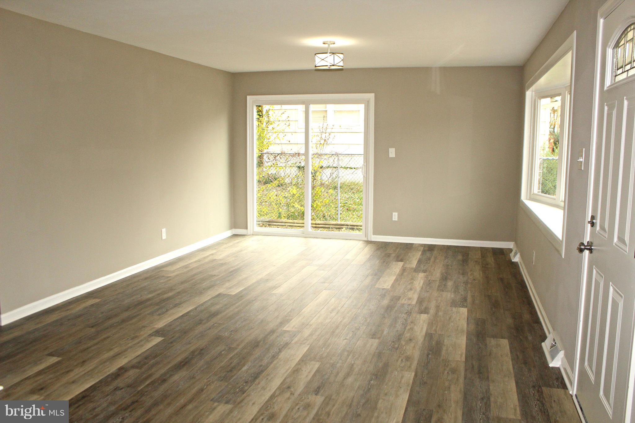 658 Andrews Road Aberdeen, MD 21001 - Photo 8 of 27 New Paint & Luxury Plank Flooring in Living Room!