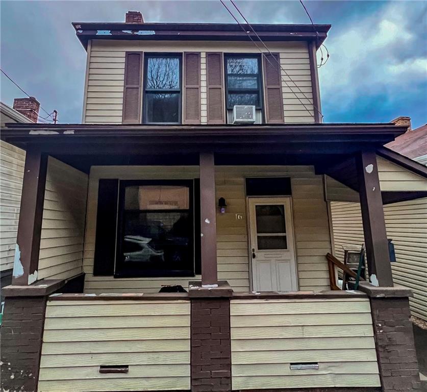 16 Spring Street Etna, PA 15223 - Photo 1 of 21 a view of a house with wooden door