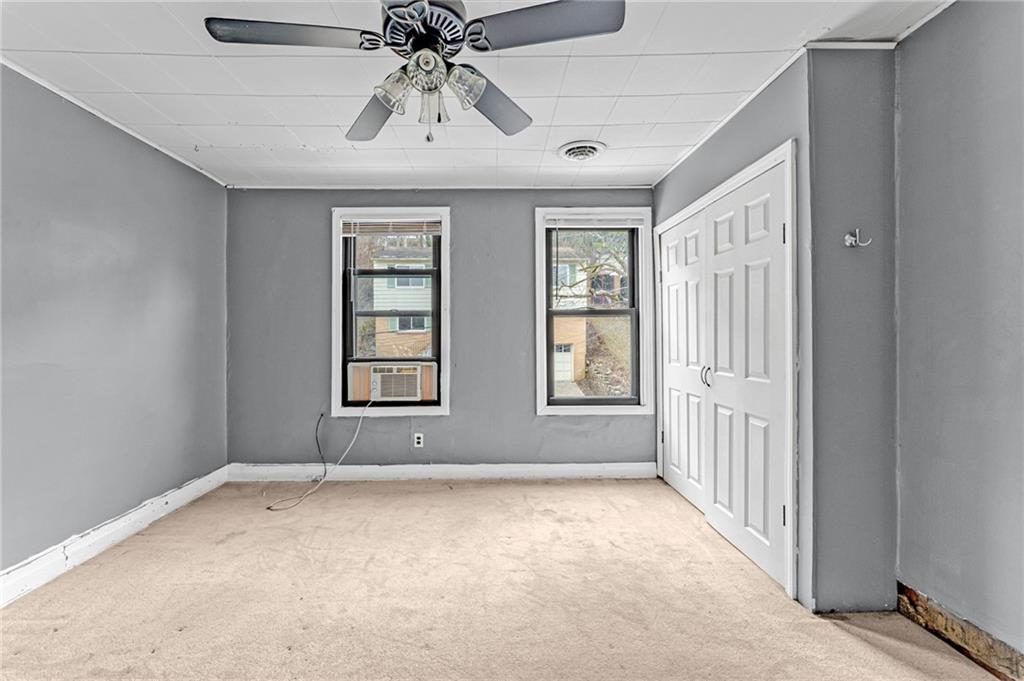 16 Spring Street Etna, PA 15223 - Photo 14 of 21 an empty room with windows